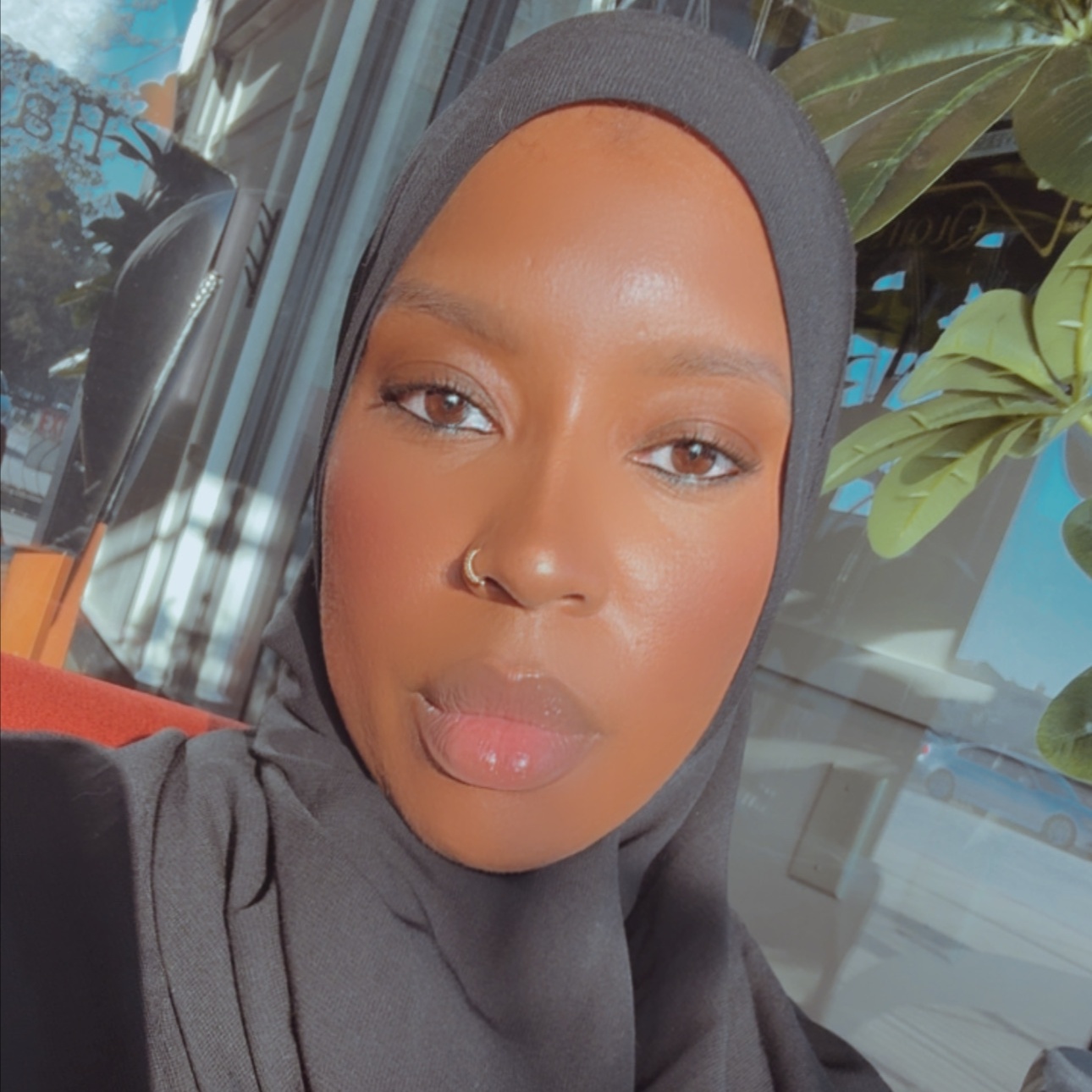 Mu’minah Mines at Blossoms HTX Hair Studio in Spring, TX