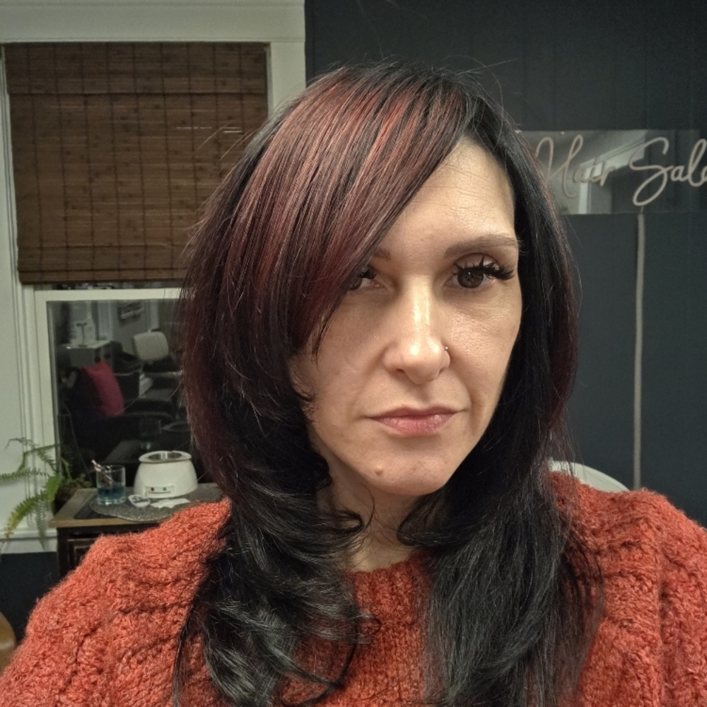 Sasha Morel at Tangles Salon LLC in North Providence, RI