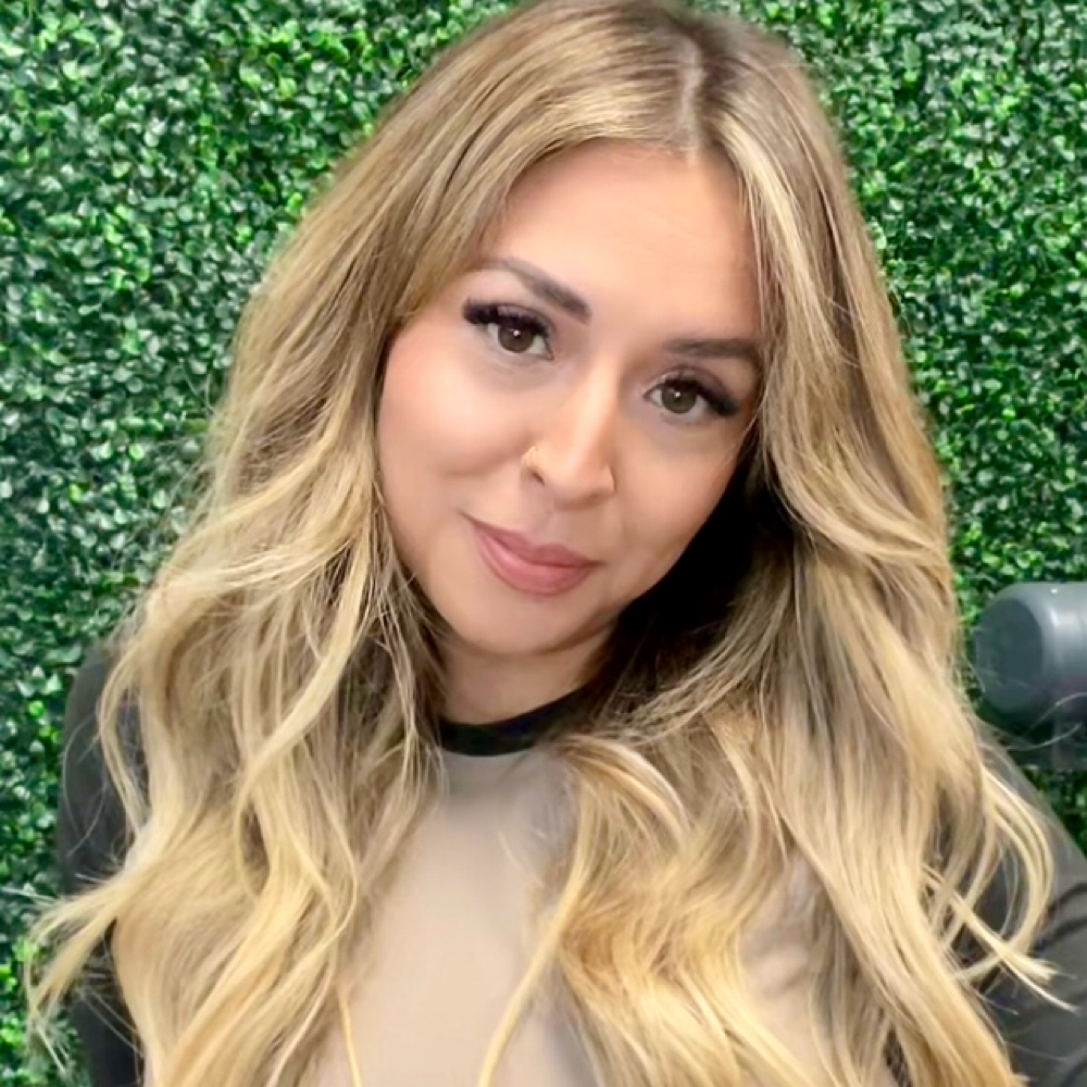 Kris Nigo at Texas Roots Hair Design in Keller, TX
