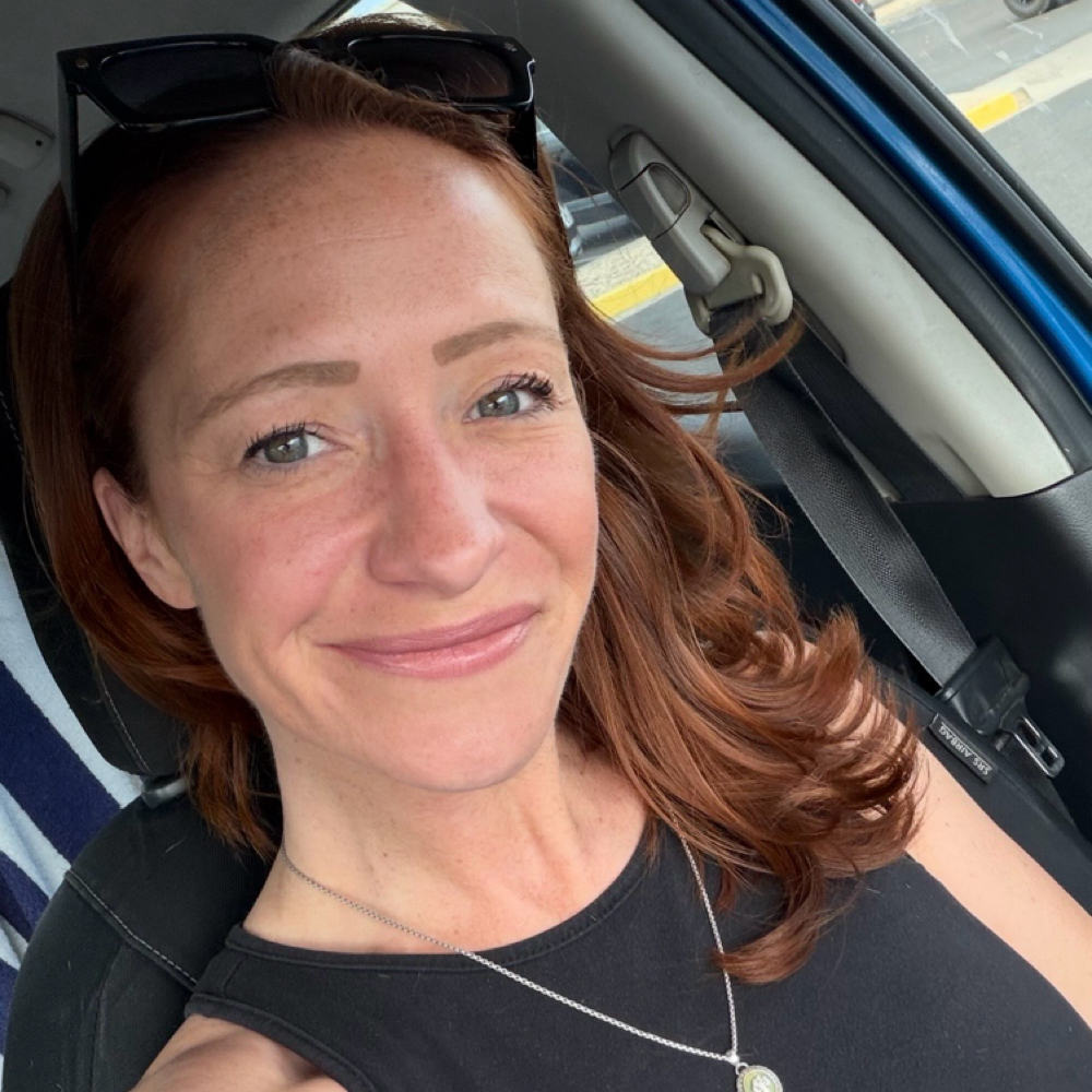 Emma Urschel at Crown and Clippers Barbershop in Scottsdale, AZ